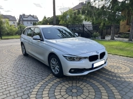 BMW 318 Station wagon in White used in WARSAW PL