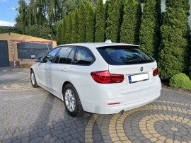 BMW 318 Station wagon in White used in WARSAW PL