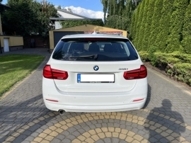 BMW 318 Station wagon in White used in WARSAW PL