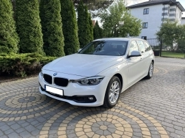 BMW 318 Station wagon in White used in WARSAW PL